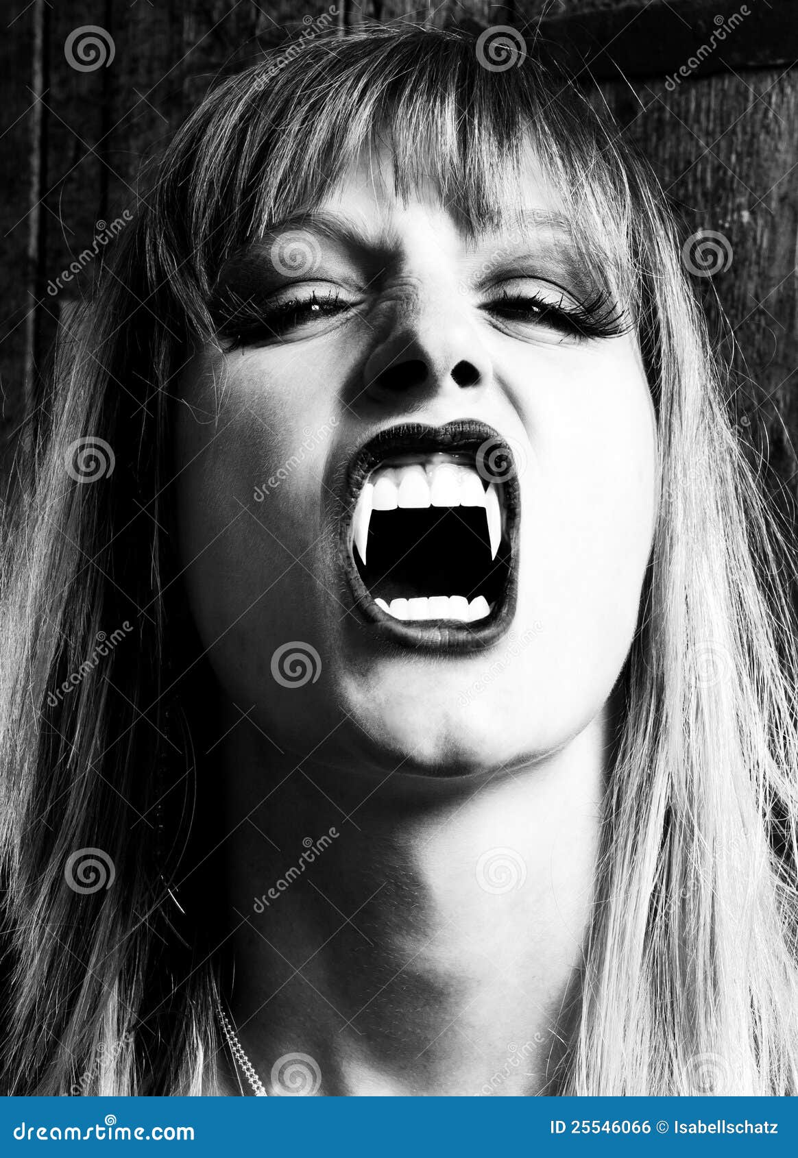 female vampire showing her fangs