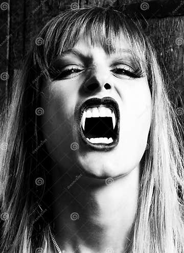 Female Vampire Showing Her Fangs Stock Photo - Image of woman ...