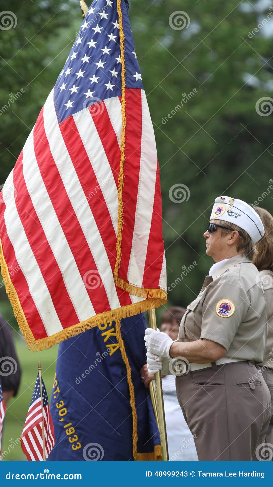 Download Female Veteran In Uniform With American Flag Editorial ...