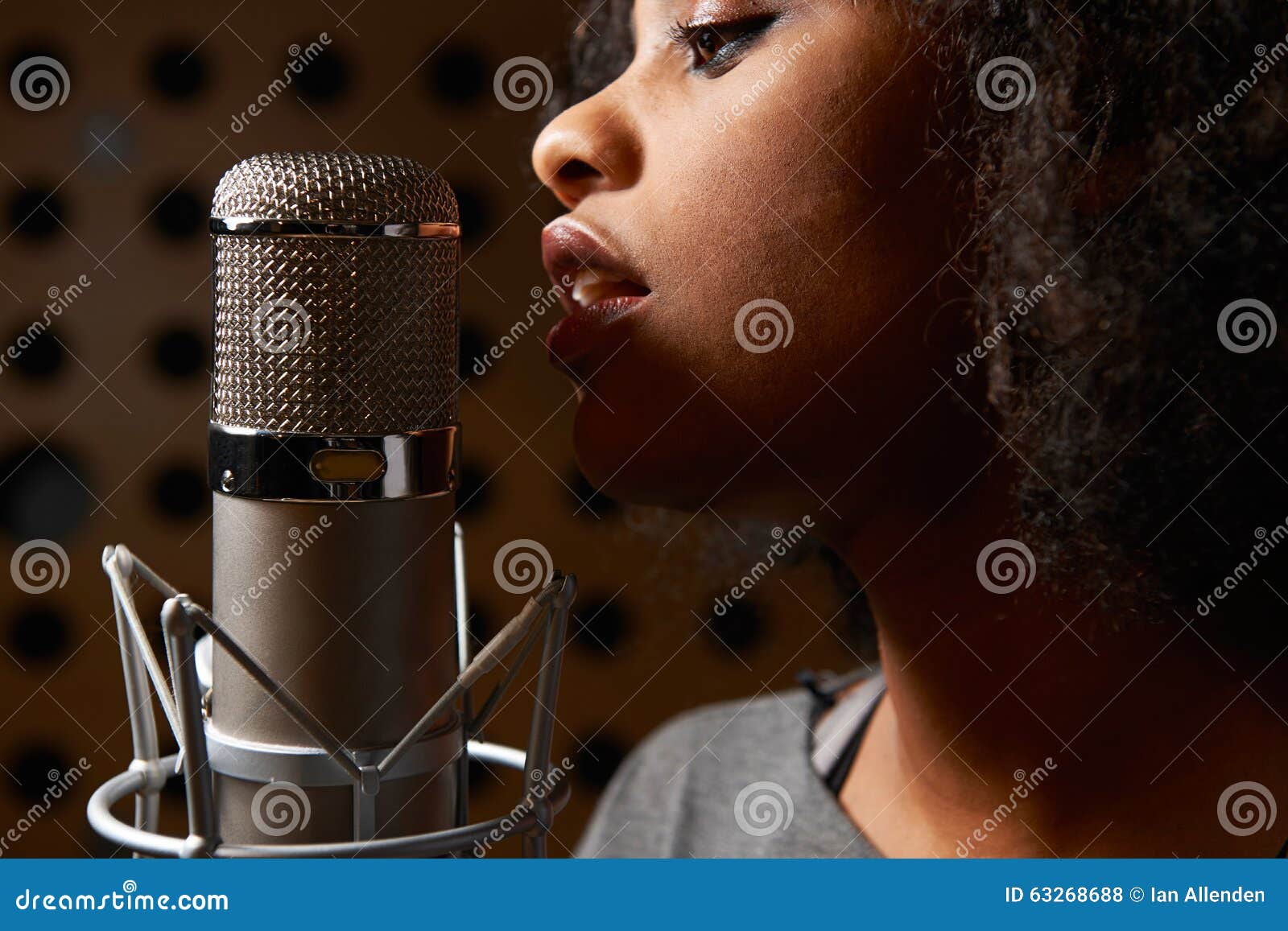 female vocalist in recording studio