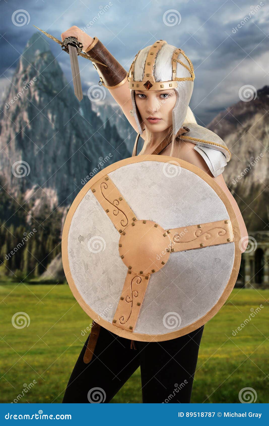 Female warrior attacking with shield and sword
