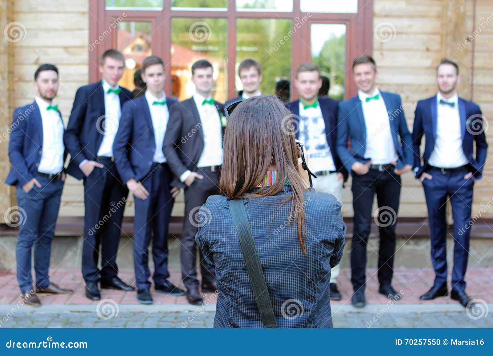 female wedding photographer in action