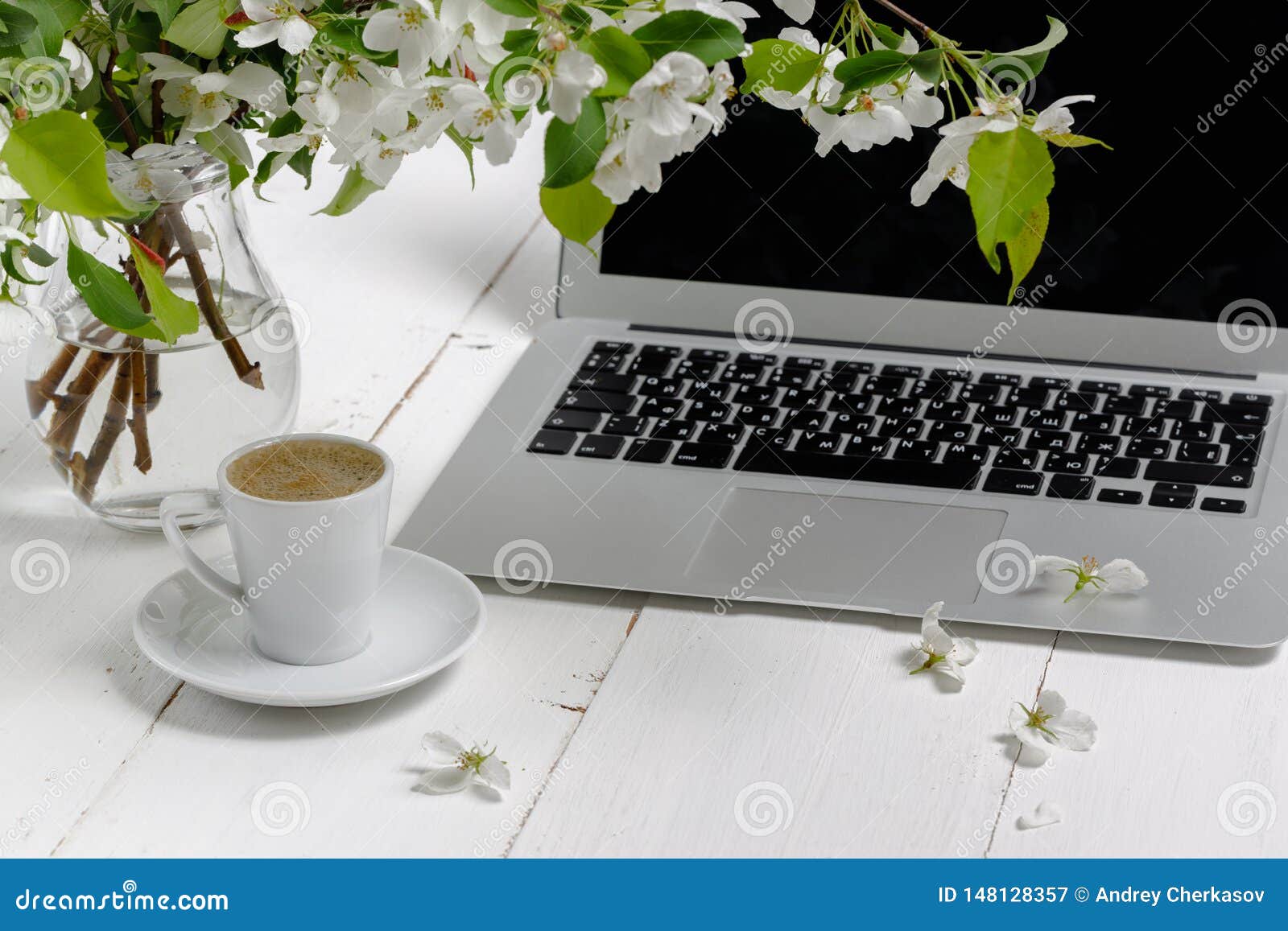 feminine workplace concept. freelance fashion comfortable femininity workspace  with laptop, coffee, flowers on white background