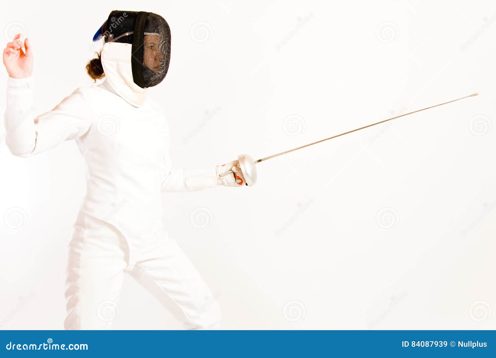 Fencing Woman. Woman dressed in a fencing suit and mask, pointing her rapier. side view