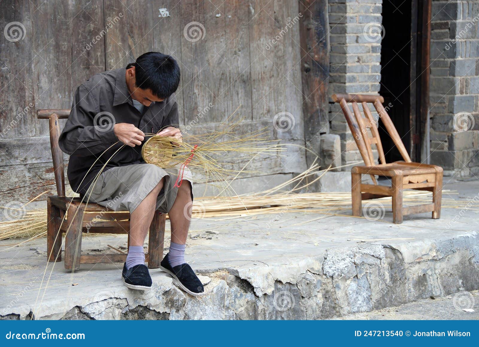 Fenghuang, Hunan Province, China: a Man Making a Basket Editorial Image ...