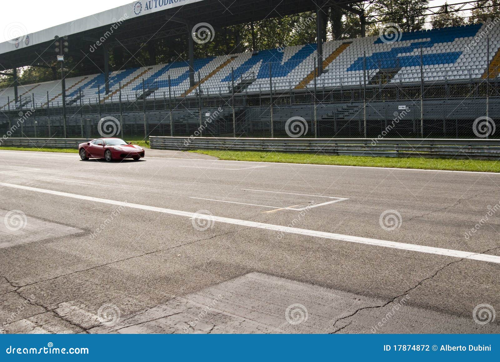 Ferrari at Autodromo di Monza. Ferrari F430 crossing the starting grid during Race Event at Autodromo di Monza 2009 - Italy