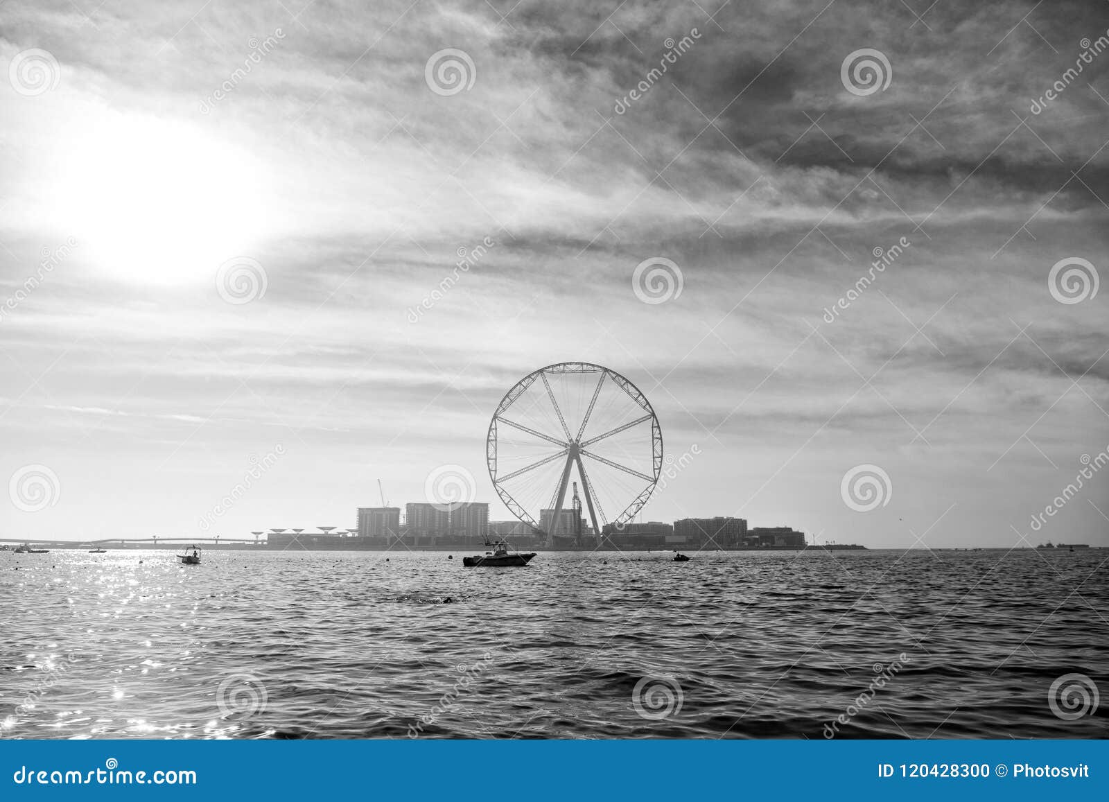 ferris wheel in dubai, united arab emirates, from blue sea