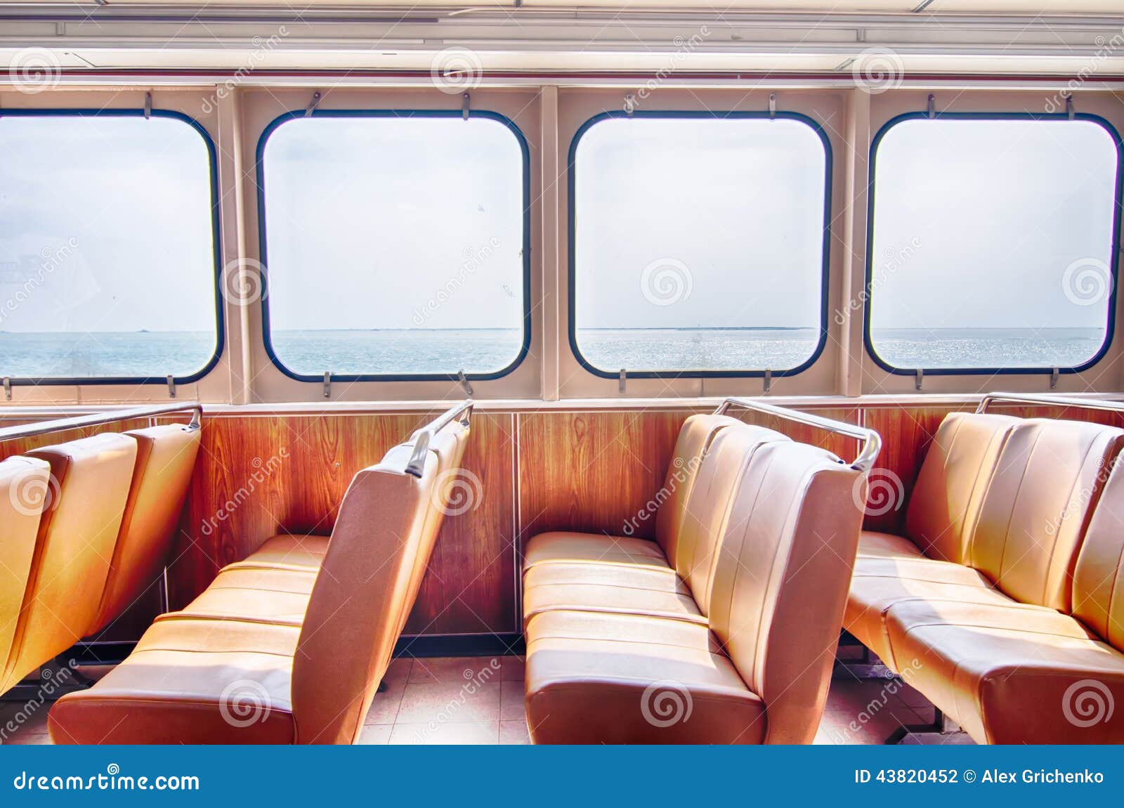 Ferry Boat Cabin and Rows of Seats Looking Out the Window Stock Photo