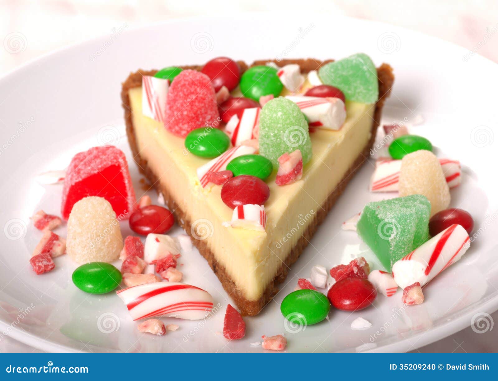 Festive Christmas Cheesecake with Assorted Candies Stock Photo - Image