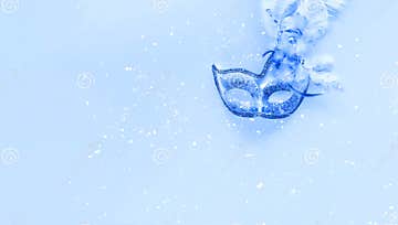 Festive Classic Blue Background with Carnival Mask. Copy Space Stock