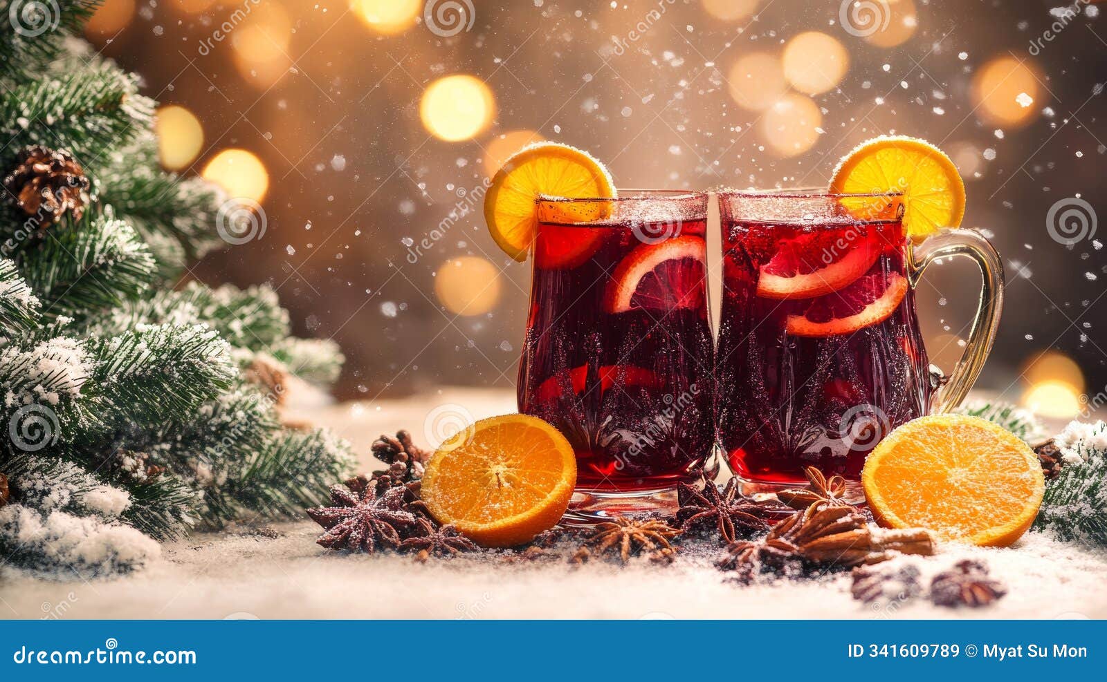 festive drinks with orange slices set against a snowy backdrop