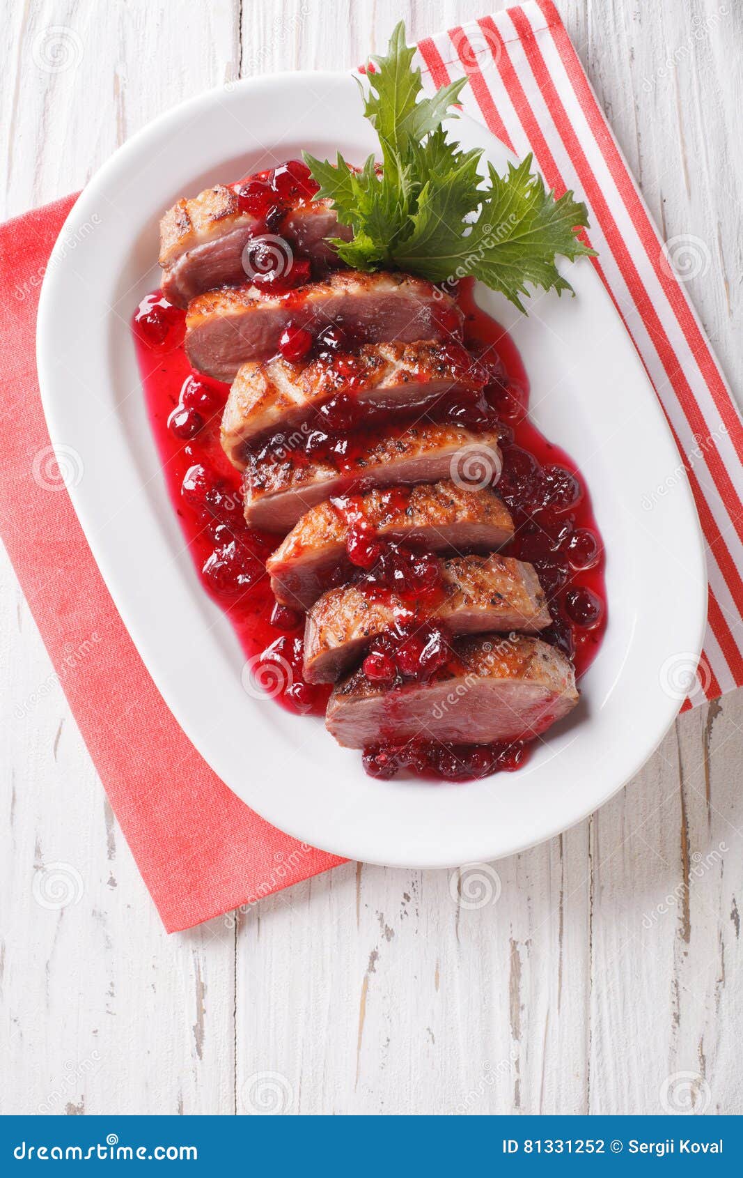 Festive Food: Roast Duck Breast with Cranberry Sauce Close-up. V Stock ...