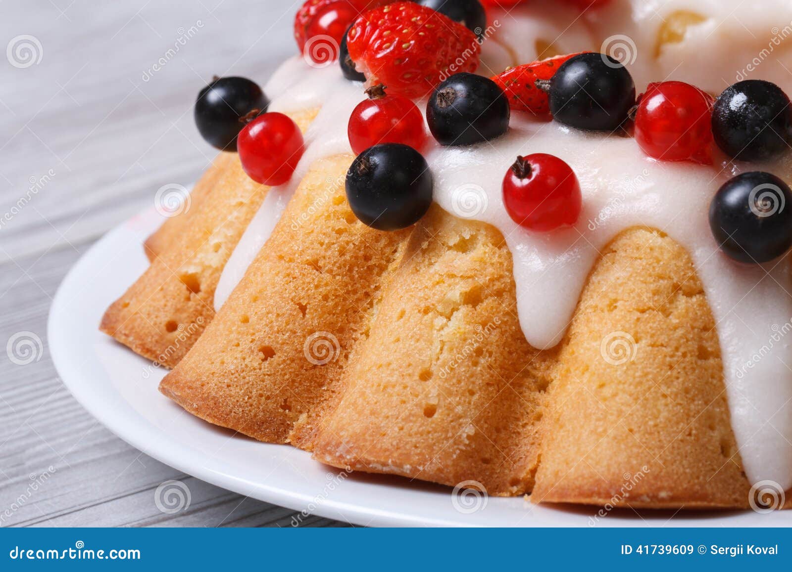 Festive Fruit Cake with Icing and Fresh Berries Macro Horizontal Stock