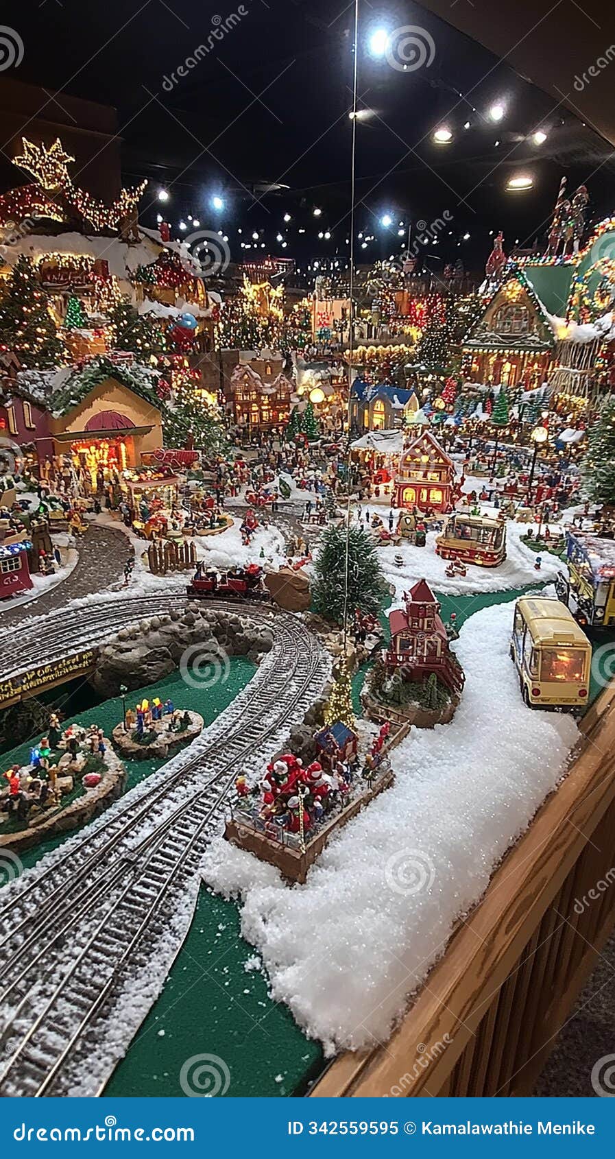 festive holiday window display featuring toys and twinkling lights