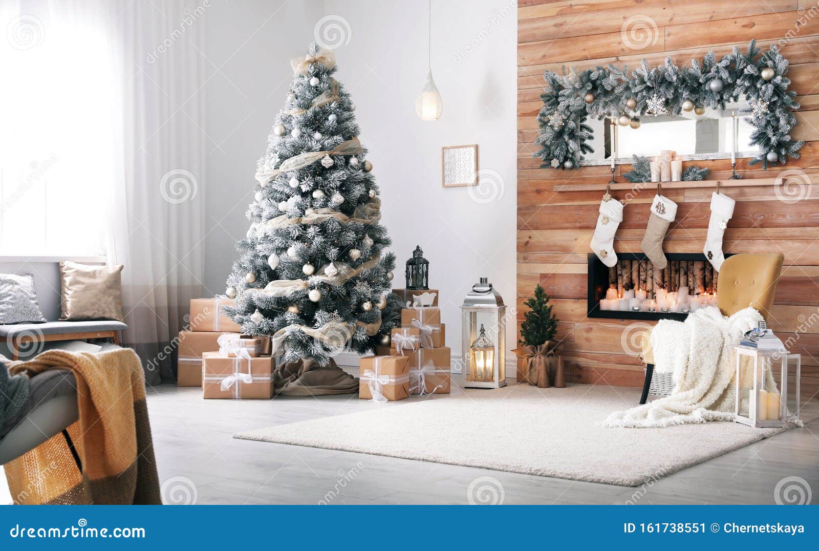 interior with decorated christmas tree and fireplace