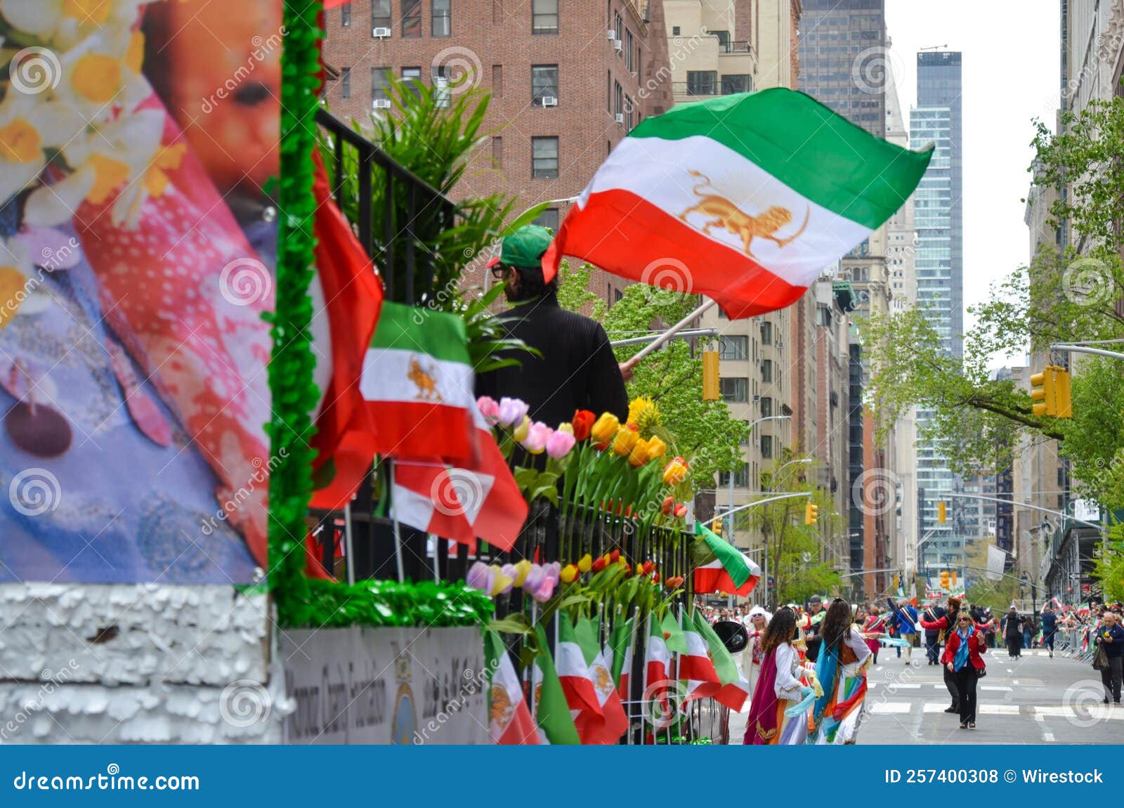 Marching with Iranian Flags and Flowers. Celebration of Annual Persian