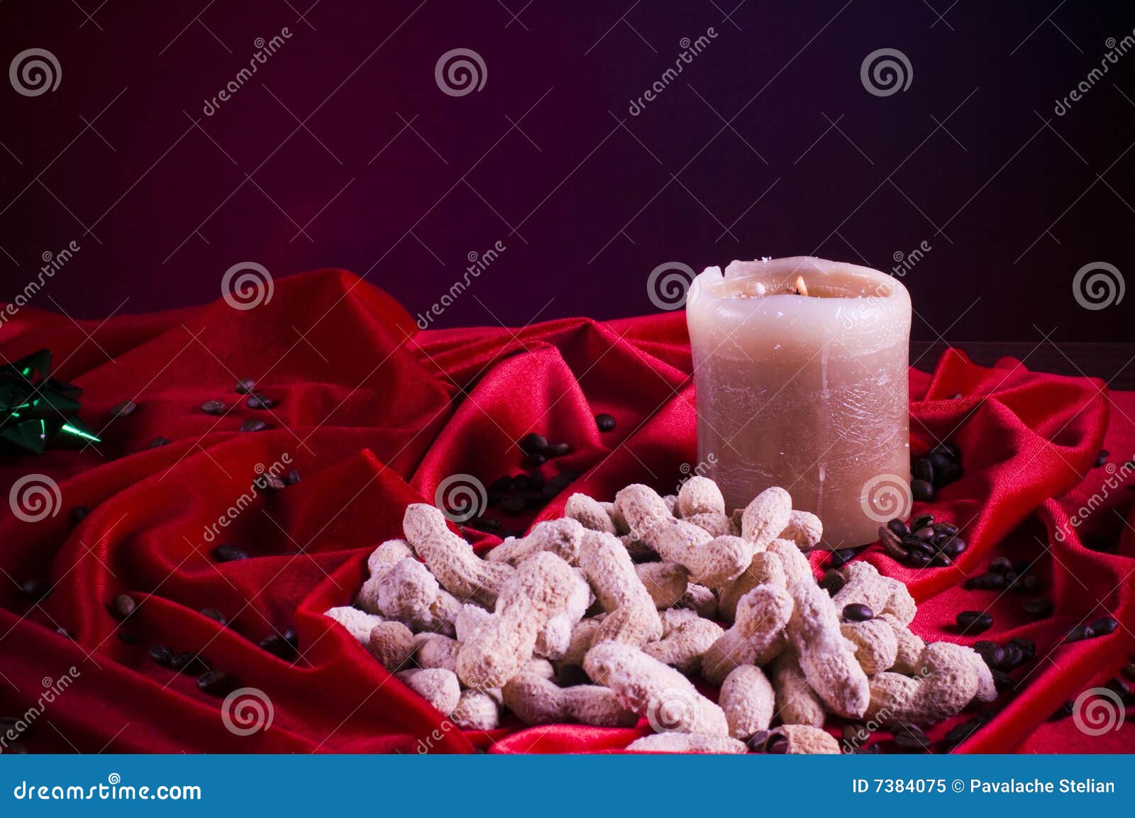 Festive nuts and candle stock image. Image of festive 7384075