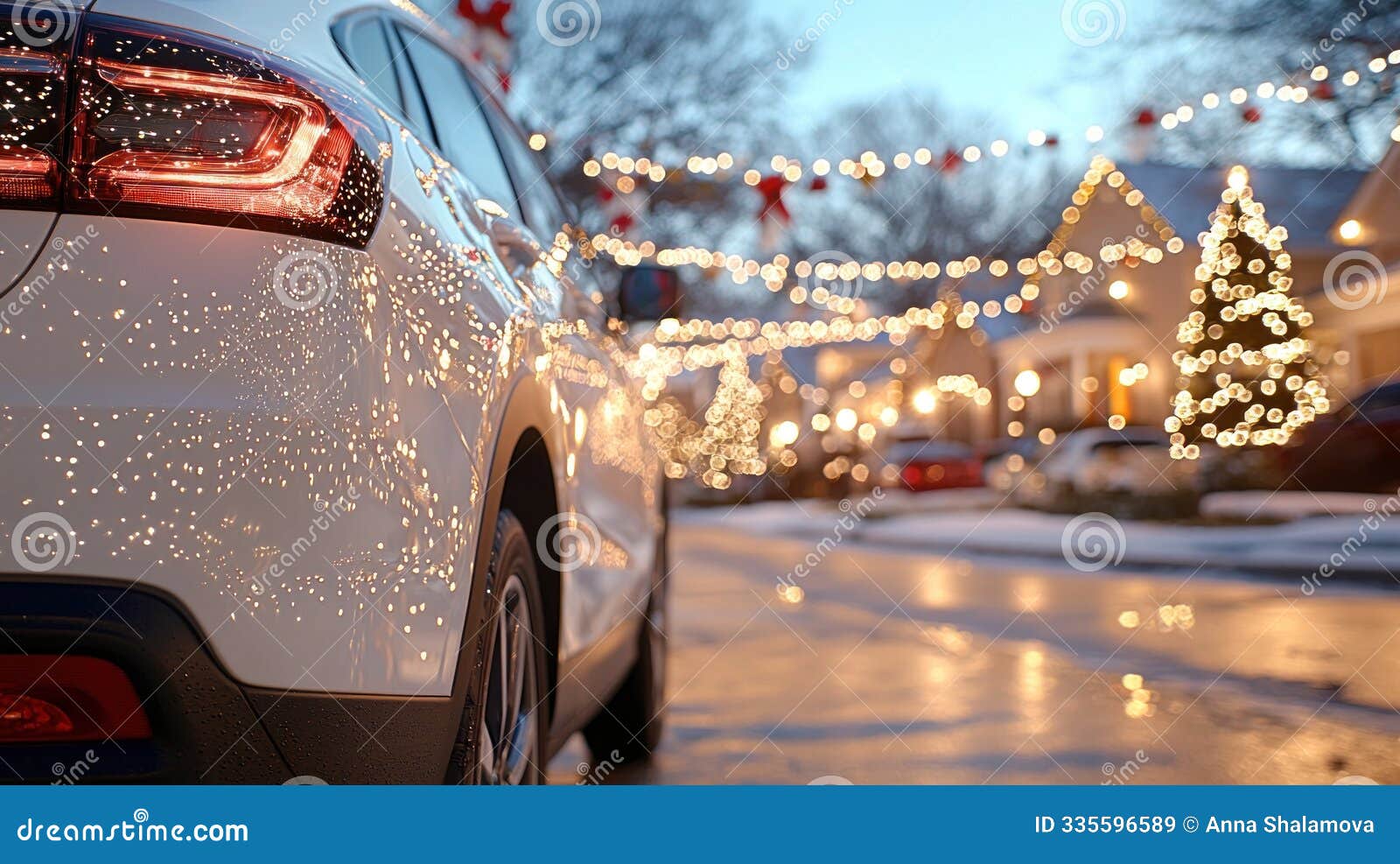 festive winter evening with car parked on snow-covered street adorned with holiday lights.