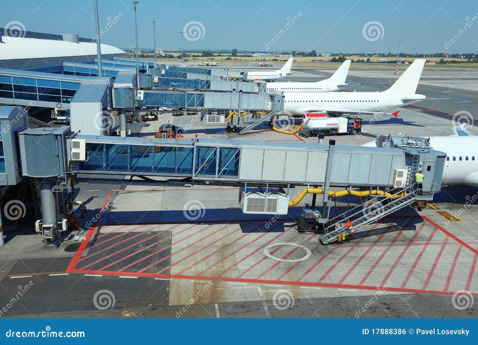 few airliners parked at airport