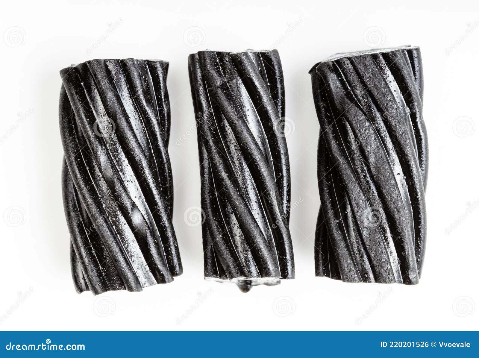 Black Licorice Is Bad For Your Health Concept With A Heart Buried In Liquorice Wheels That