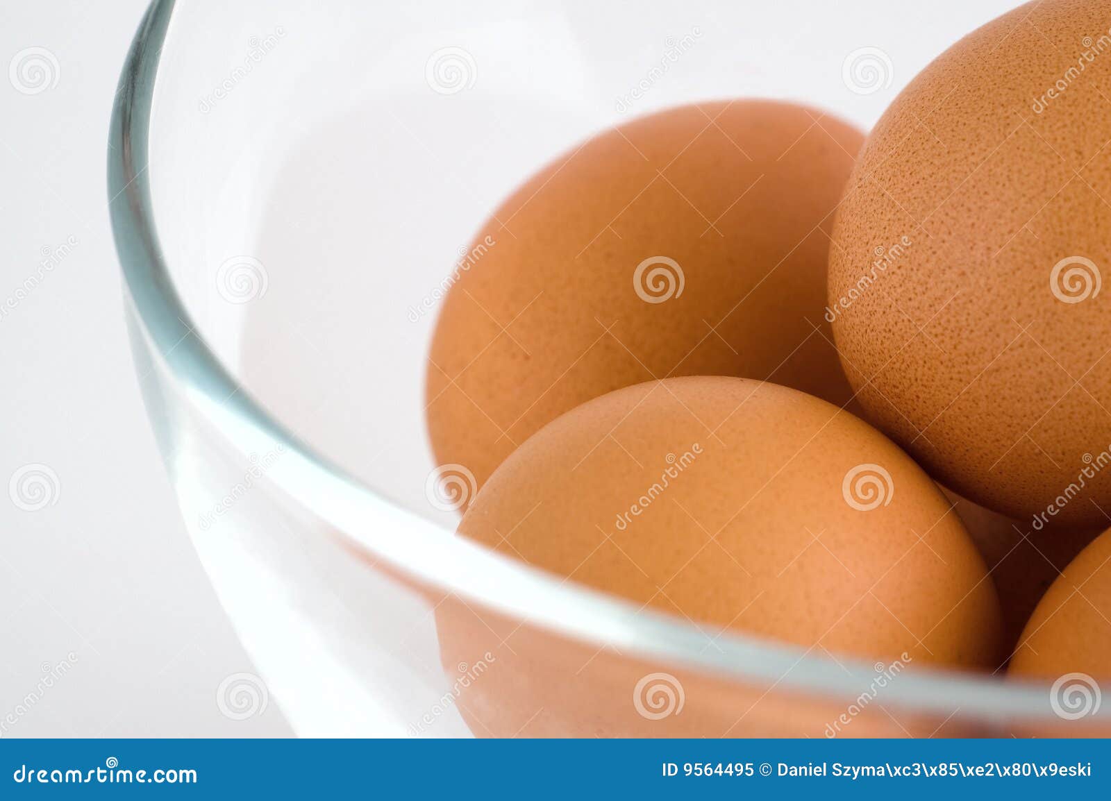 few eggs in glass bowl