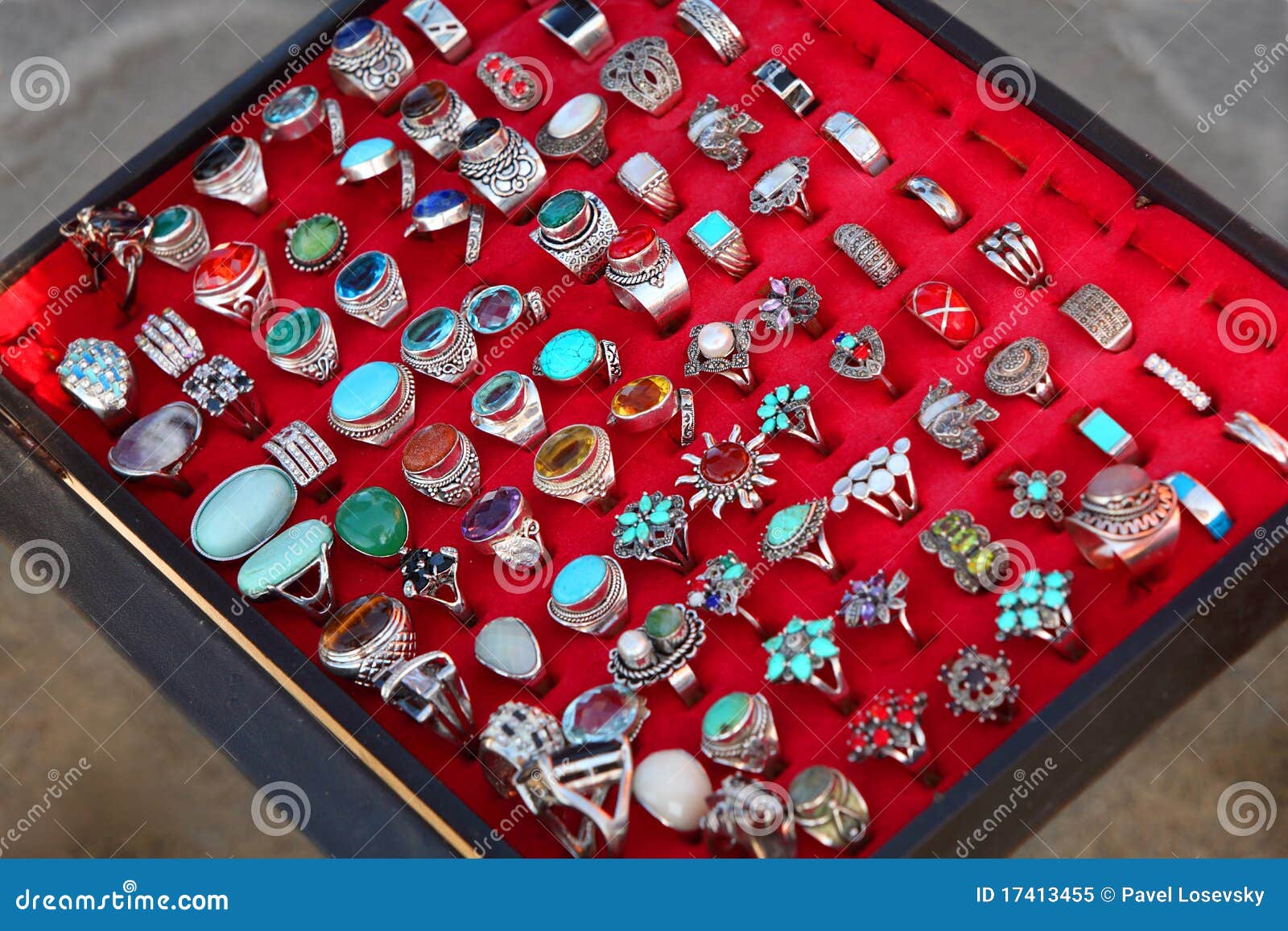 Few Rows of Souvenir Large Rings on Red Stock Image Image of