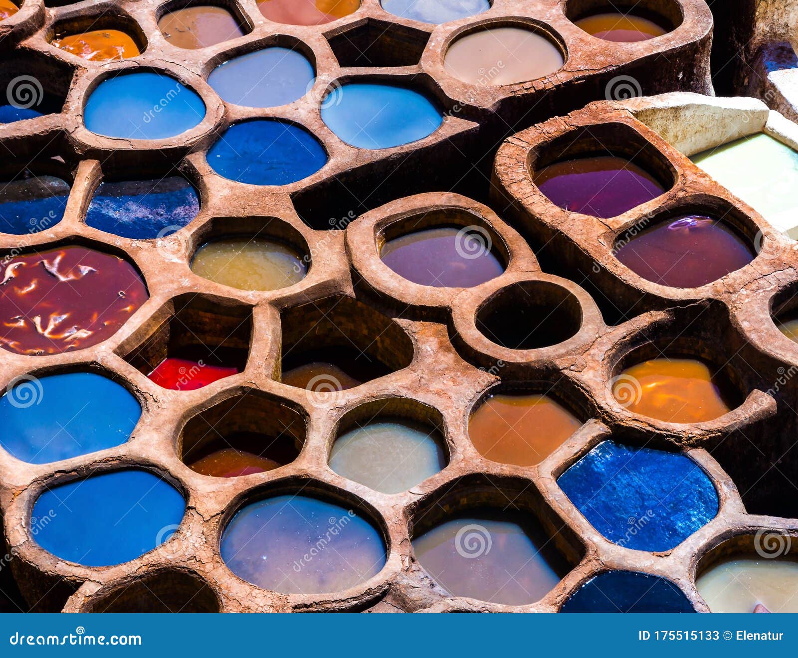 fez is also famous for its old leather tanneries. old tanks of the fez`s tanneries with color paint for leather, morocco, africa.