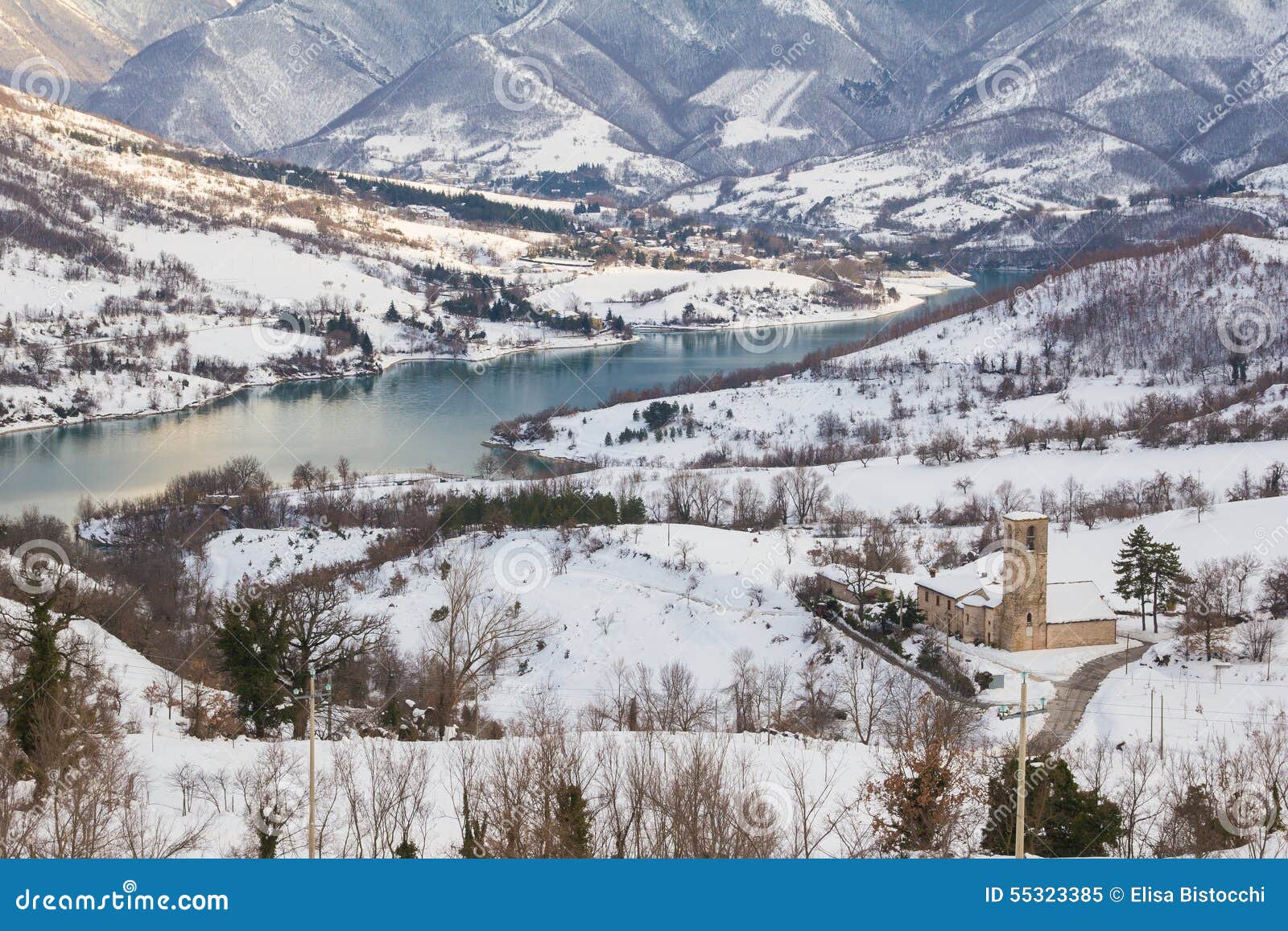 fiastra lake with snow on the national park of sibillini mountains