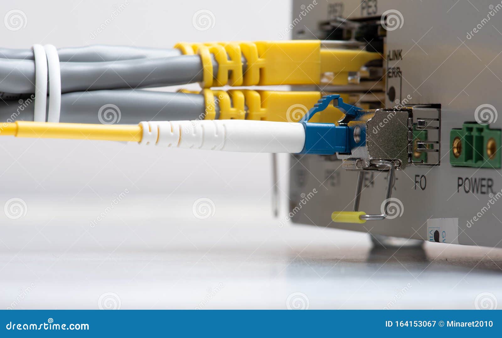 Fiber Optic and Network Patch Cord Cable Connect To the Switch