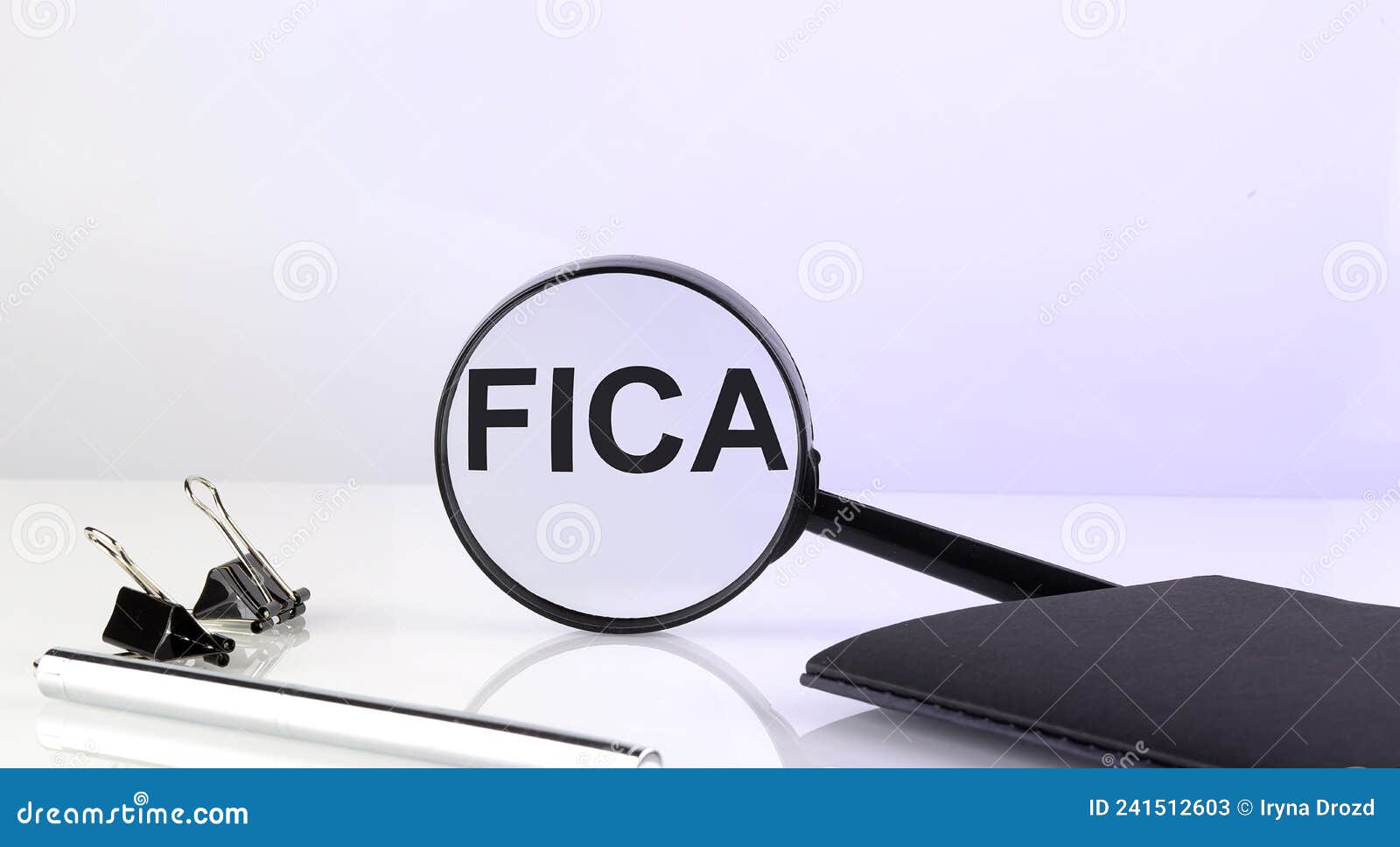 fica concept. magnifier glass with text with notebook and pen