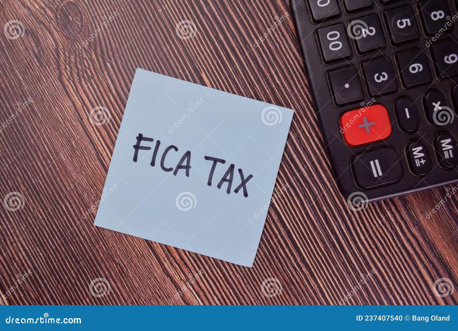 fica tax write on sticky notes  on wooden table