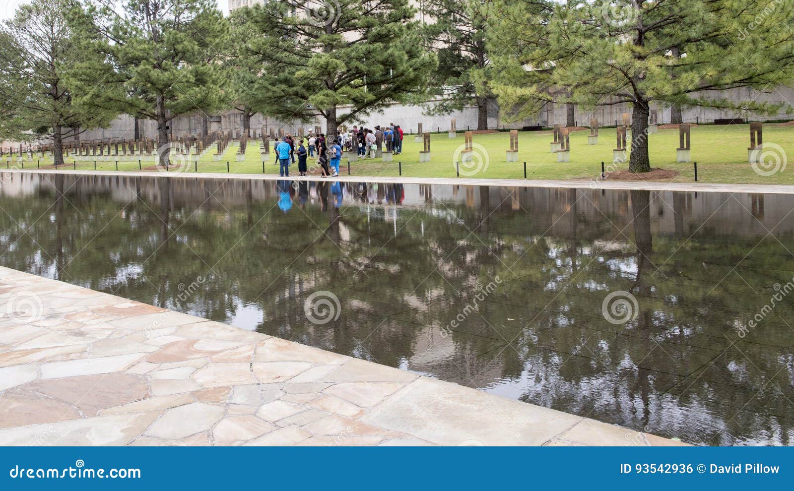 Field Of Empty Chairs Granite Walkway And Reflective Pool