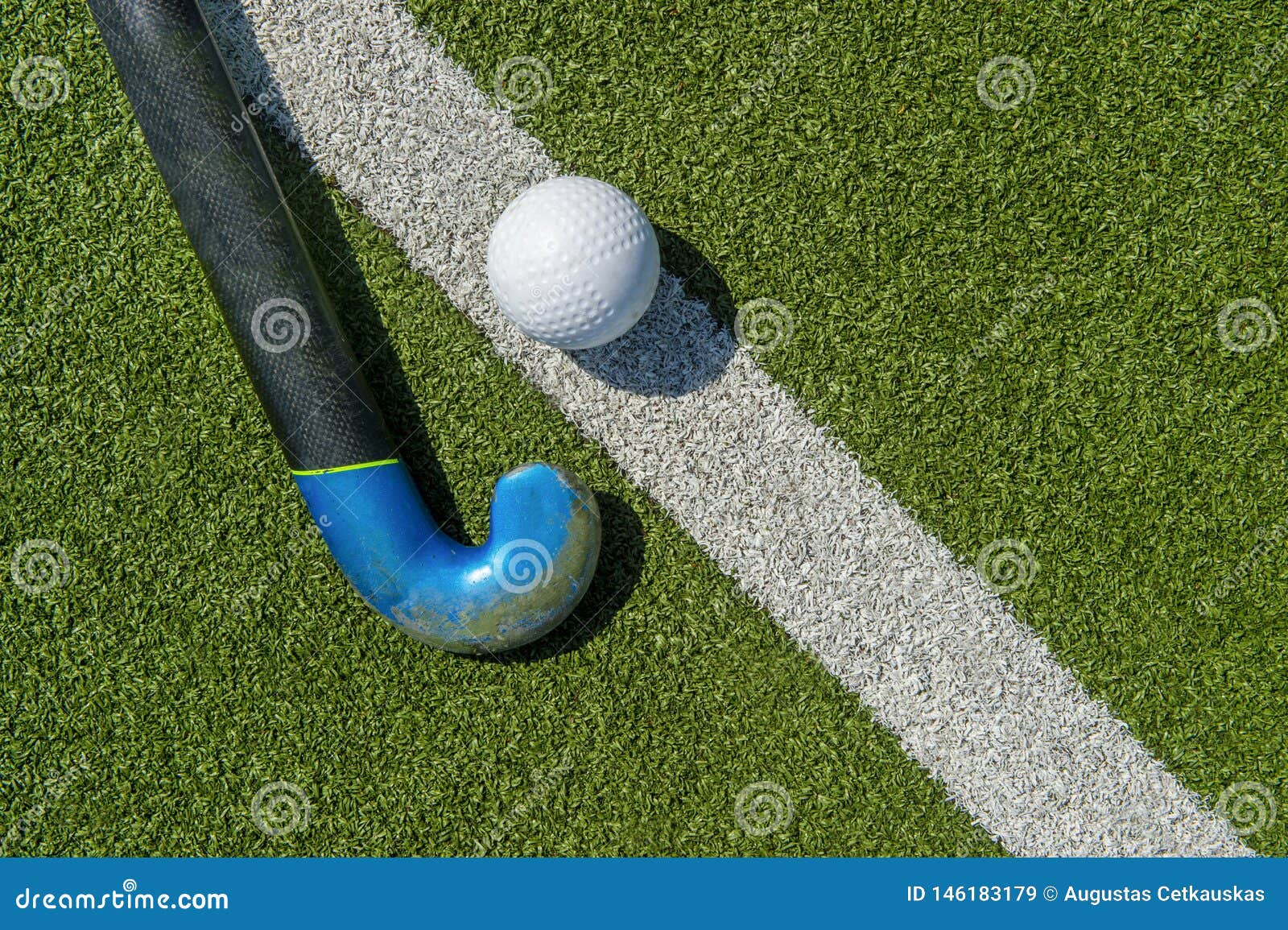 Field Hockey Stick and Ball on the Green Field Stock Image Image of