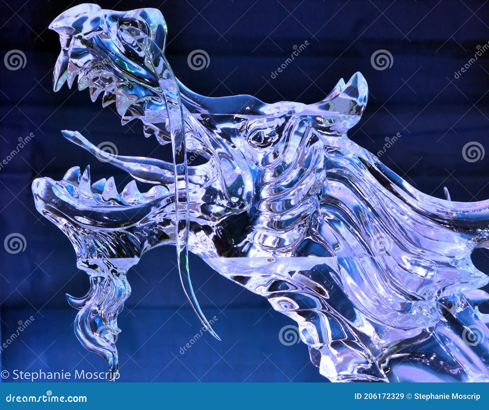 fierce roaring dragon ice sculpture with blue backgroud