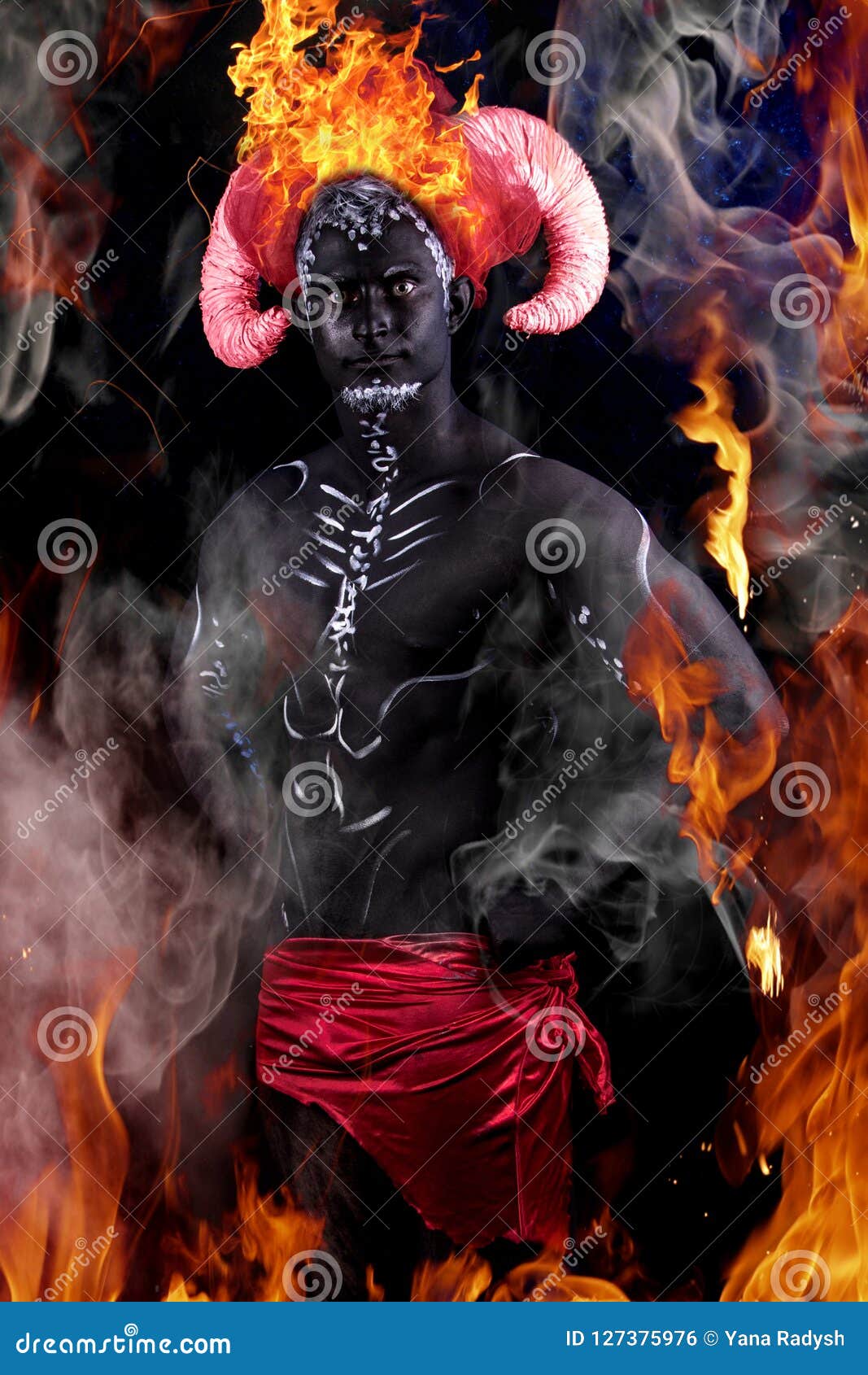 Fiery Demon. A Burning Demon With Horns And An Apple Of Discord
