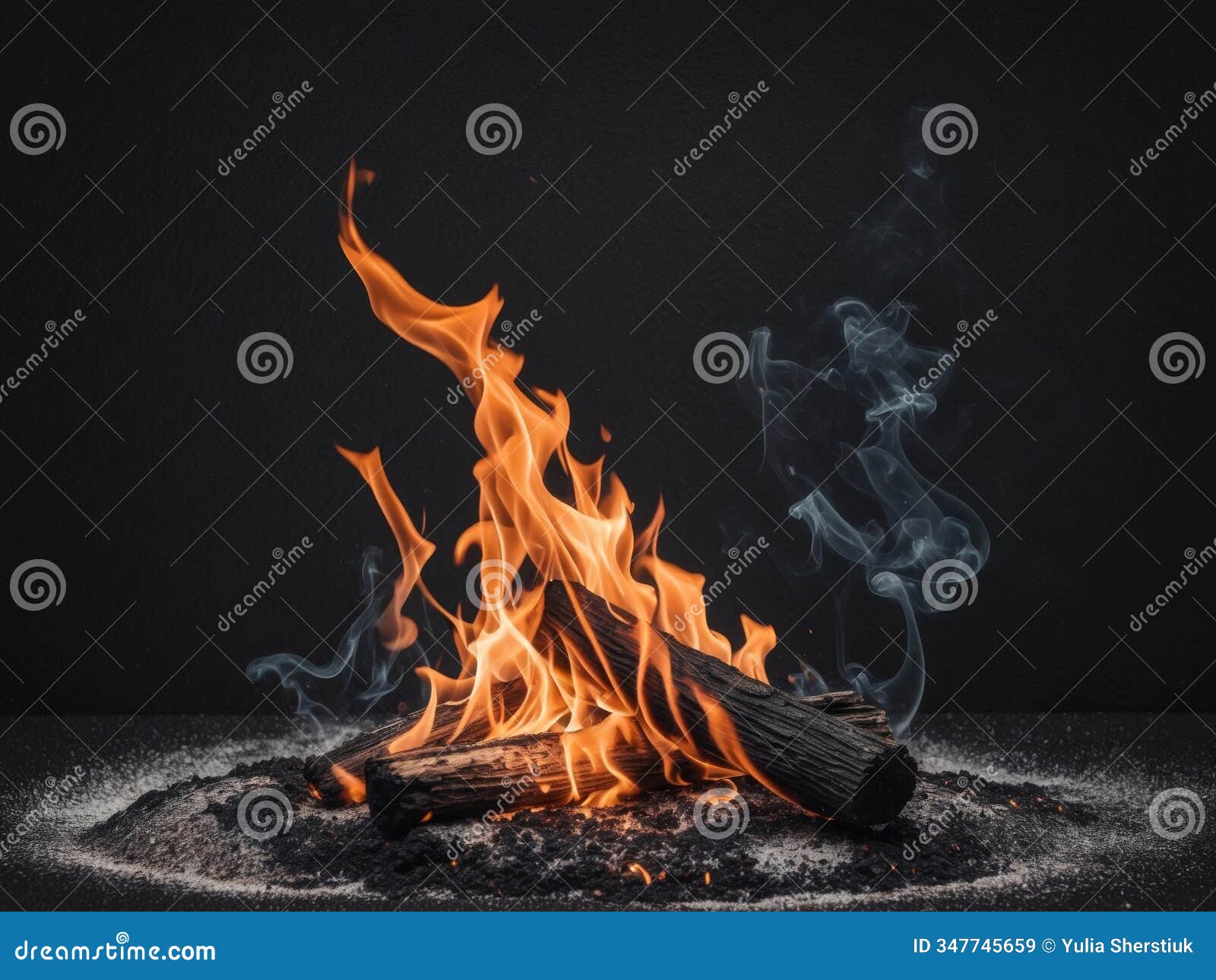 fiery flames and smoldering ashes on dark ground background.
