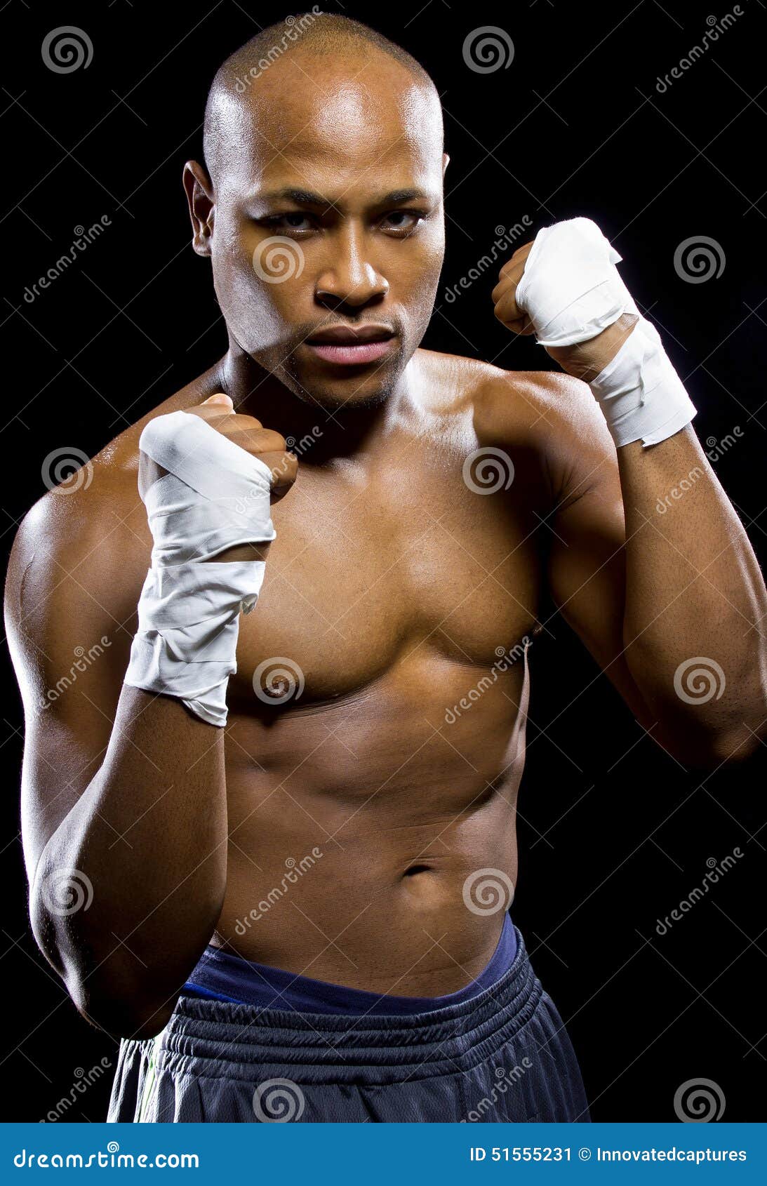 Fighter Flexing Muscles stock image. Image of abdominal 51555231