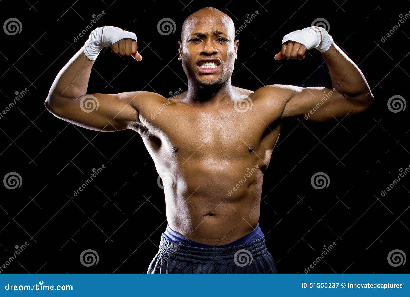 Fighter Flexing Muscles stock image. Image of bodybuilding 51555237
