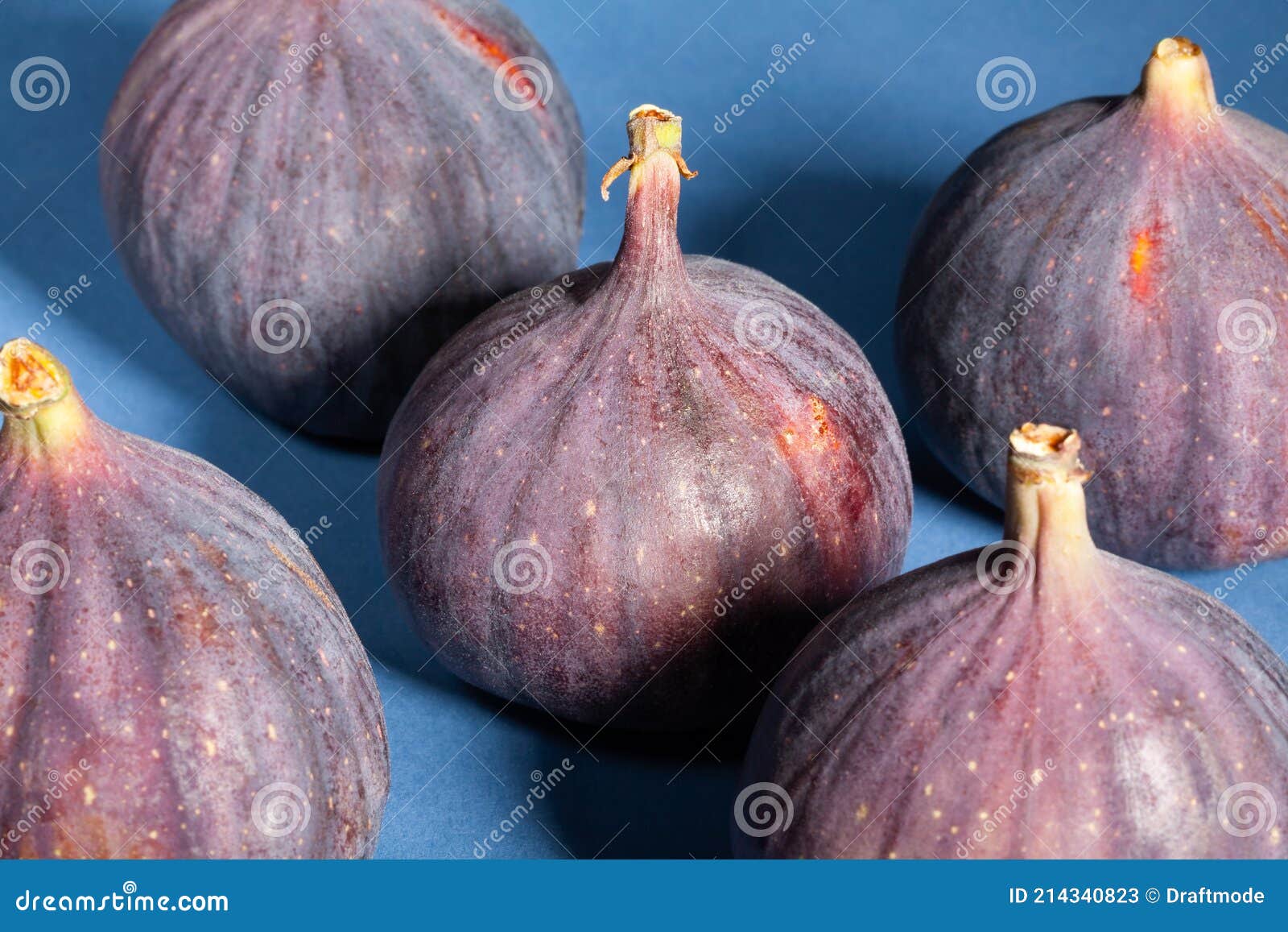 Figs group on blue stock image. Image of five, tasty 214340823