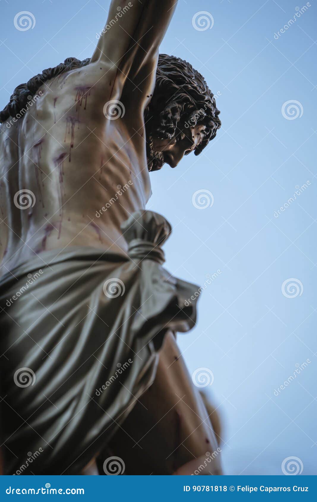 figure of jesus on the cross carved in wood by the sculptor alva