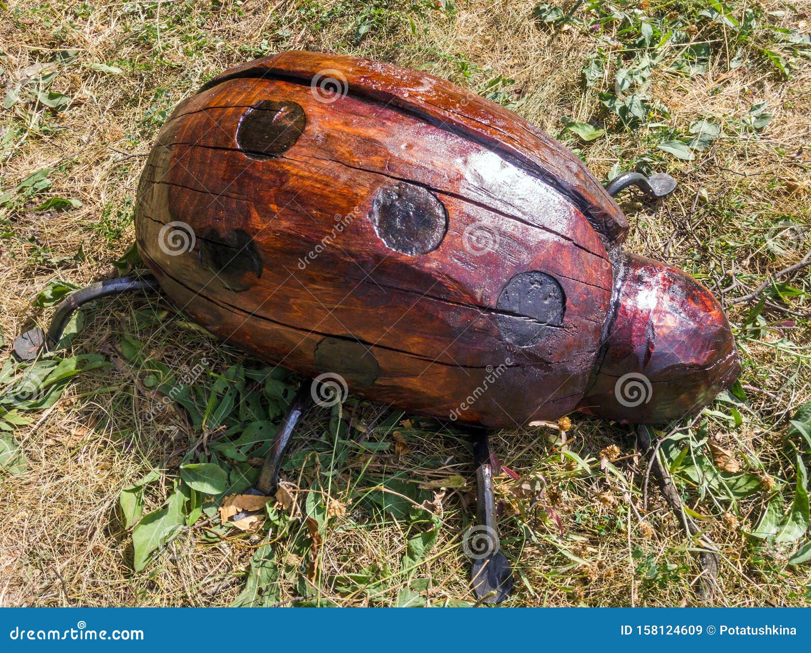The Figure of a Ladybug Made of Wood and Reinforcement Editorial Stock