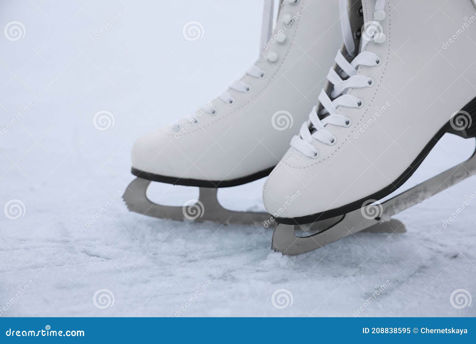 Figure Skates with Laces on Ice. Winter Outdoors Activities Stock Image