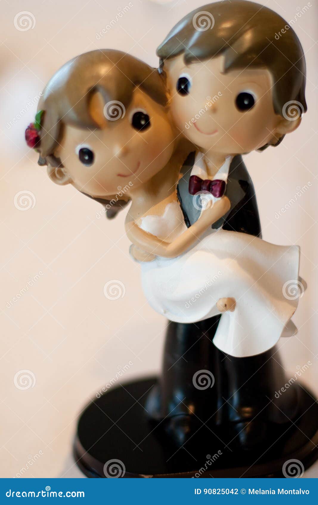 figures from the wedding cake