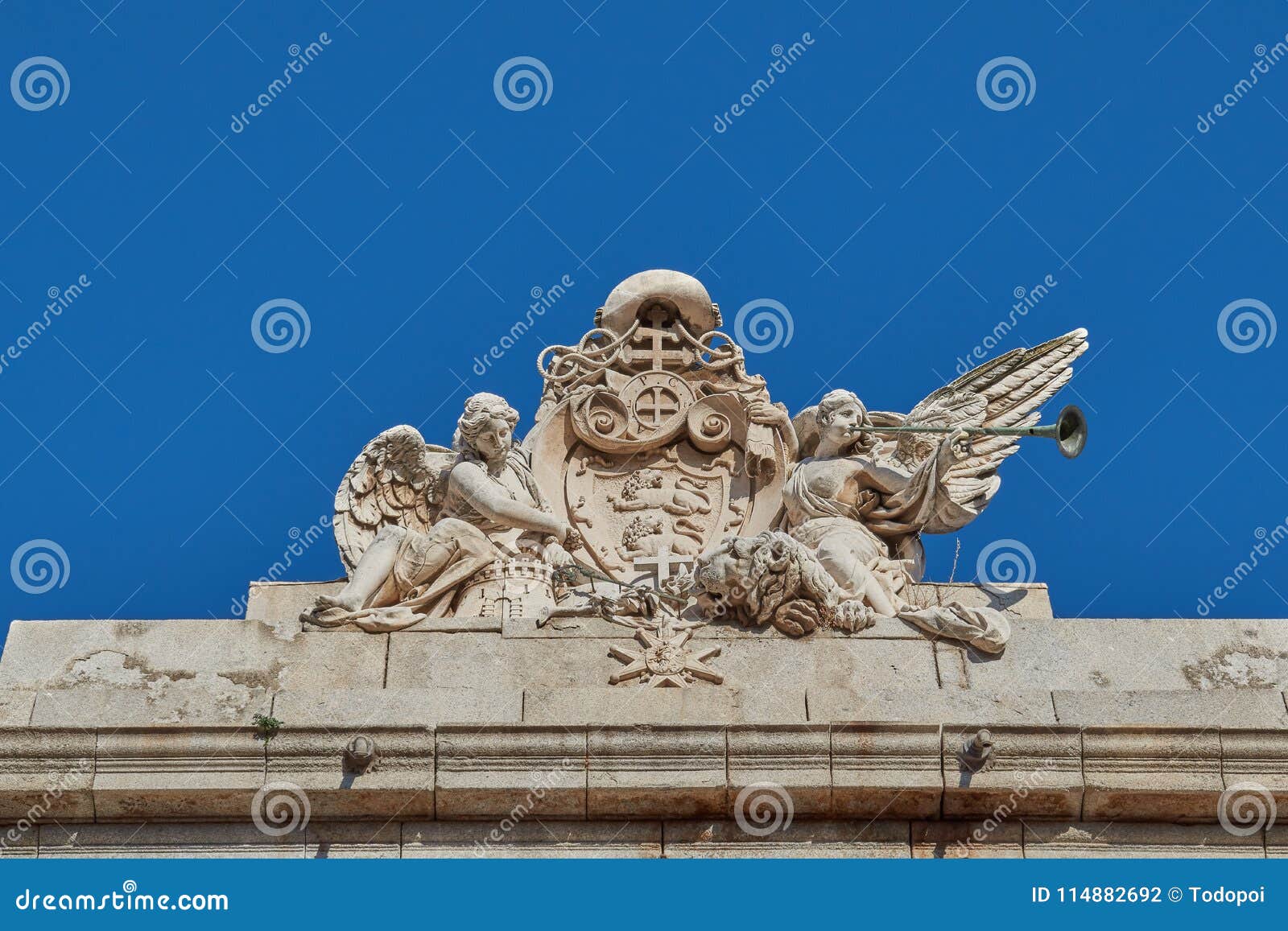 figures of winged women of the lorenzana university palace in toledo, spain