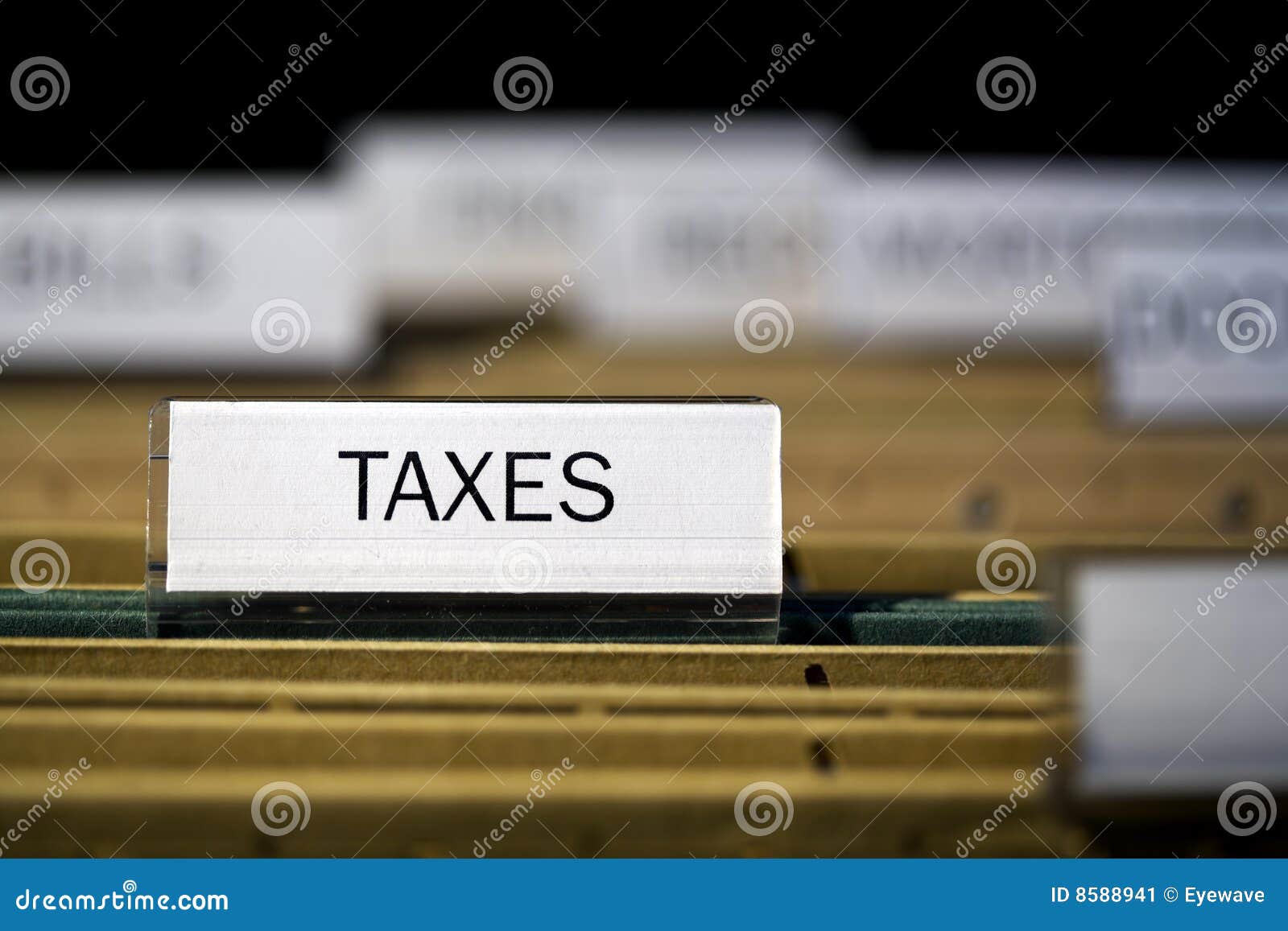 File folder labeled taxes stock image. Image of selective 8588941