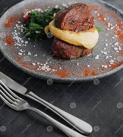 Filet Mignon with Mashed Potatoes in a Restaurant Stock Photo - Image