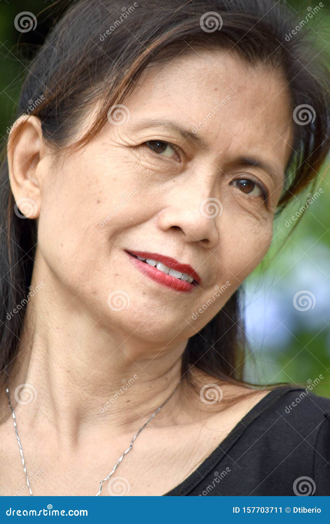 A Smiling Filipina Female Senior Stock Image Image Of Retiree
