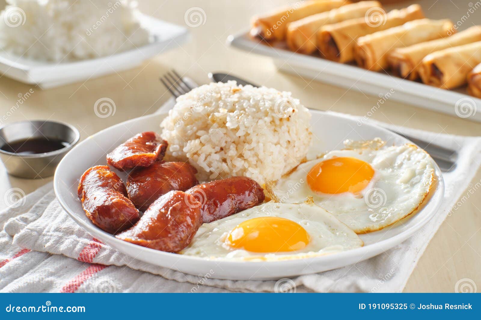 Filipino Silog Breakfast with Garlic Fried Rice, Longsilog, and Two