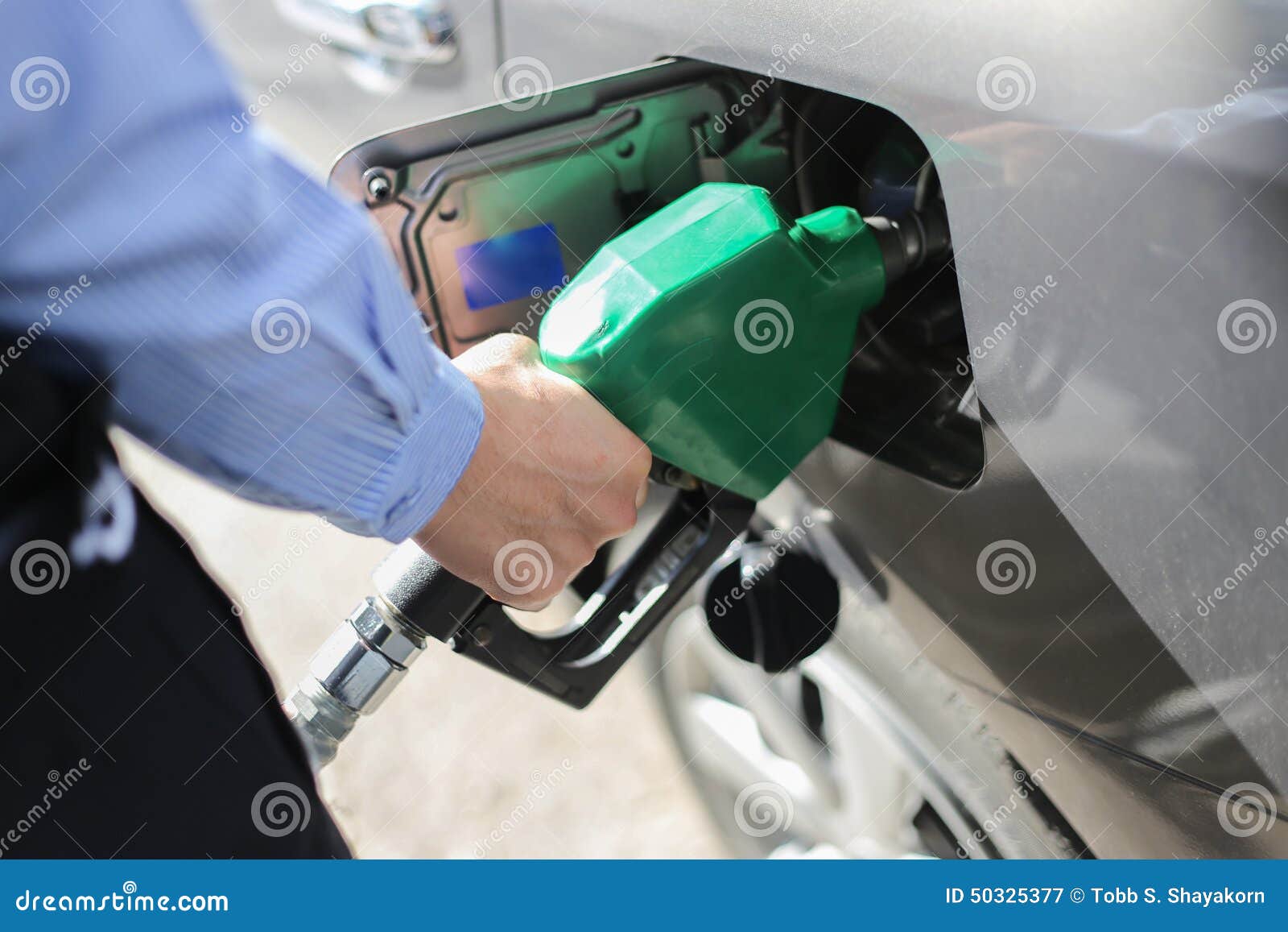 Fill the gas tank stock image. Image of business, hand 50325377