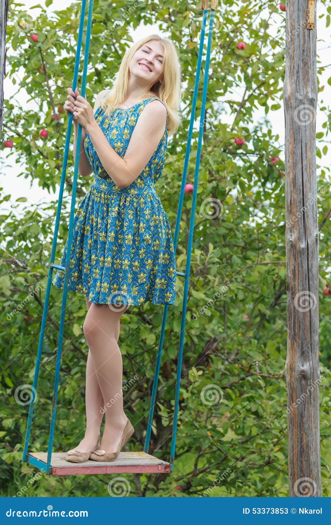 Fill Length Portrait of Blonde Girl in Silk Sundress on Handmade Swing ...